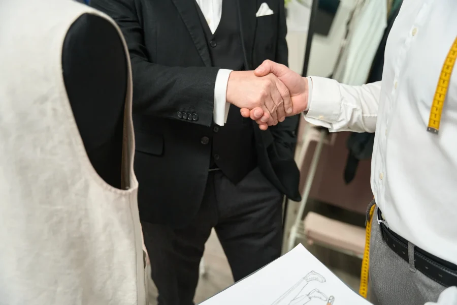 gentleman-exchanging-handshake-with-fashion-design-2025-03-05-15-17-03-utc